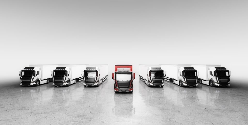 Fleet of trucks with cargo trailers. Transport, shipping industry.